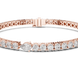 Pear accent lab grown diamond tennis bracelet with round diamonds and central pear cut diamond in gold variations