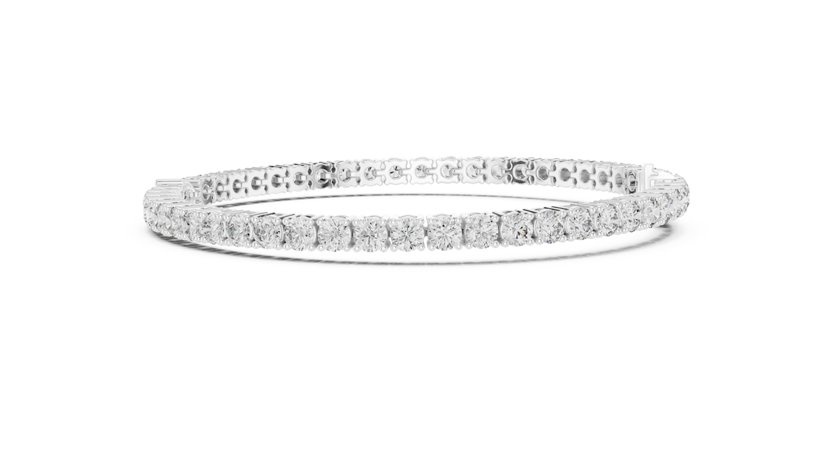 Pear accent lab grown diamond tennis bracelet with round diamonds and central pear cut diamond in gold variations