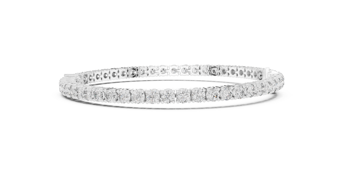 Pear accent lab grown diamond tennis bracelet with round diamonds and central pear cut diamond in gold variations
