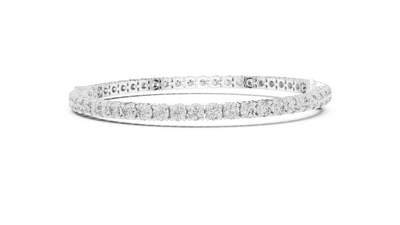 Pear accent lab grown diamond tennis bracelet with round diamonds and central pear cut diamond in gold variations