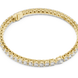 Pear accent lab grown diamond tennis bracelet with round diamonds and central pear cut diamond in gold variations