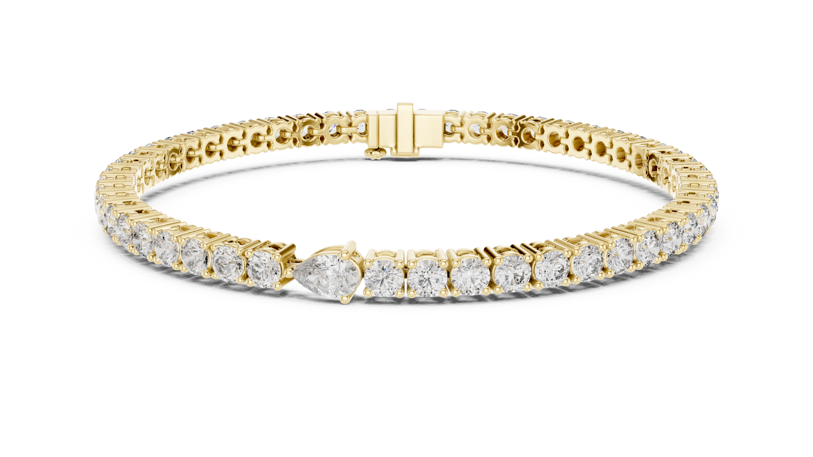 Pear accent lab grown diamond tennis bracelet with round diamonds and central pear cut diamond in gold variations