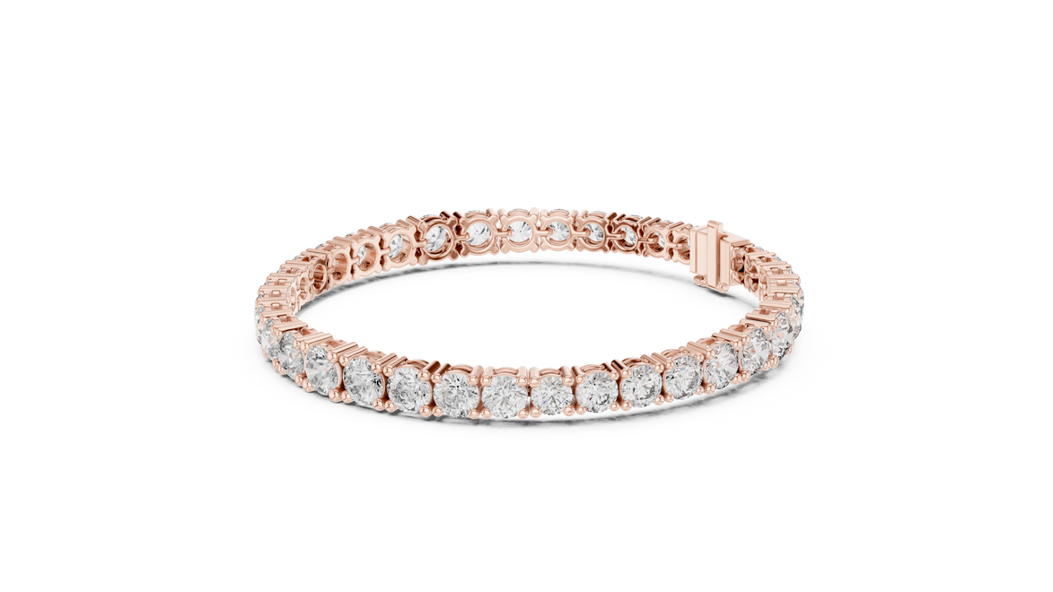 Graduated lab grown diamond tennis bracelet with varying size round diamonds in yellow white and rose gold
