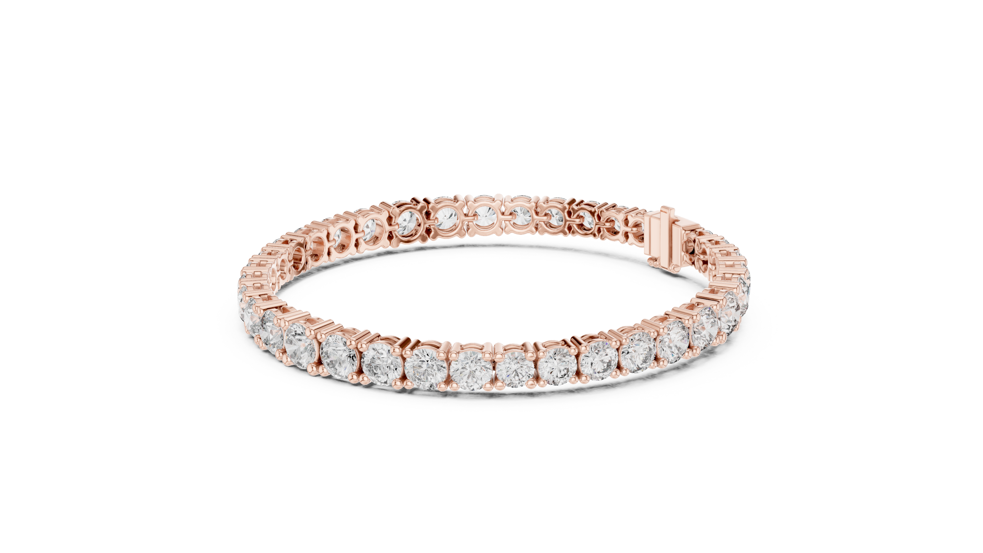 Graduated lab grown diamond tennis bracelet with varying size round diamonds in yellow white and rose gold