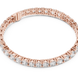 Graduated lab grown diamond tennis bracelet with varying size round diamonds in yellow white and rose gold