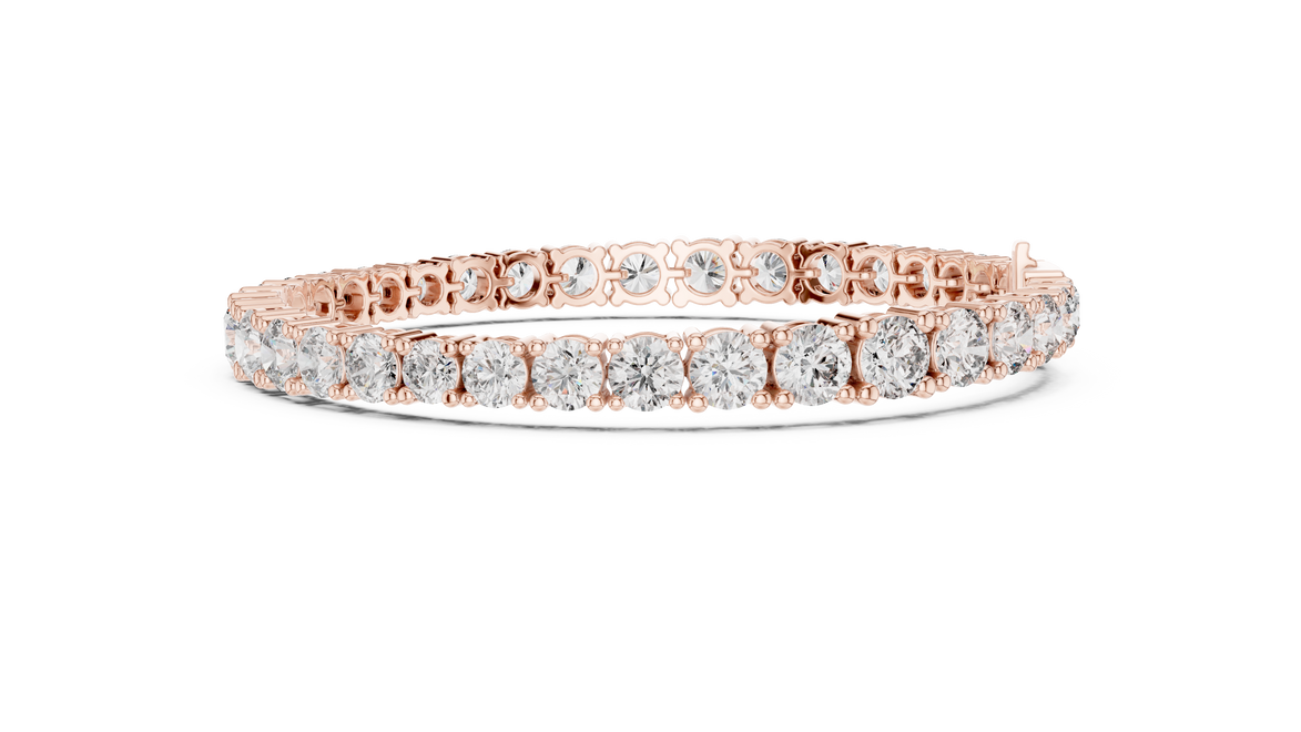 Graduated lab grown diamond tennis bracelet with varying size round diamonds in yellow white and rose gold