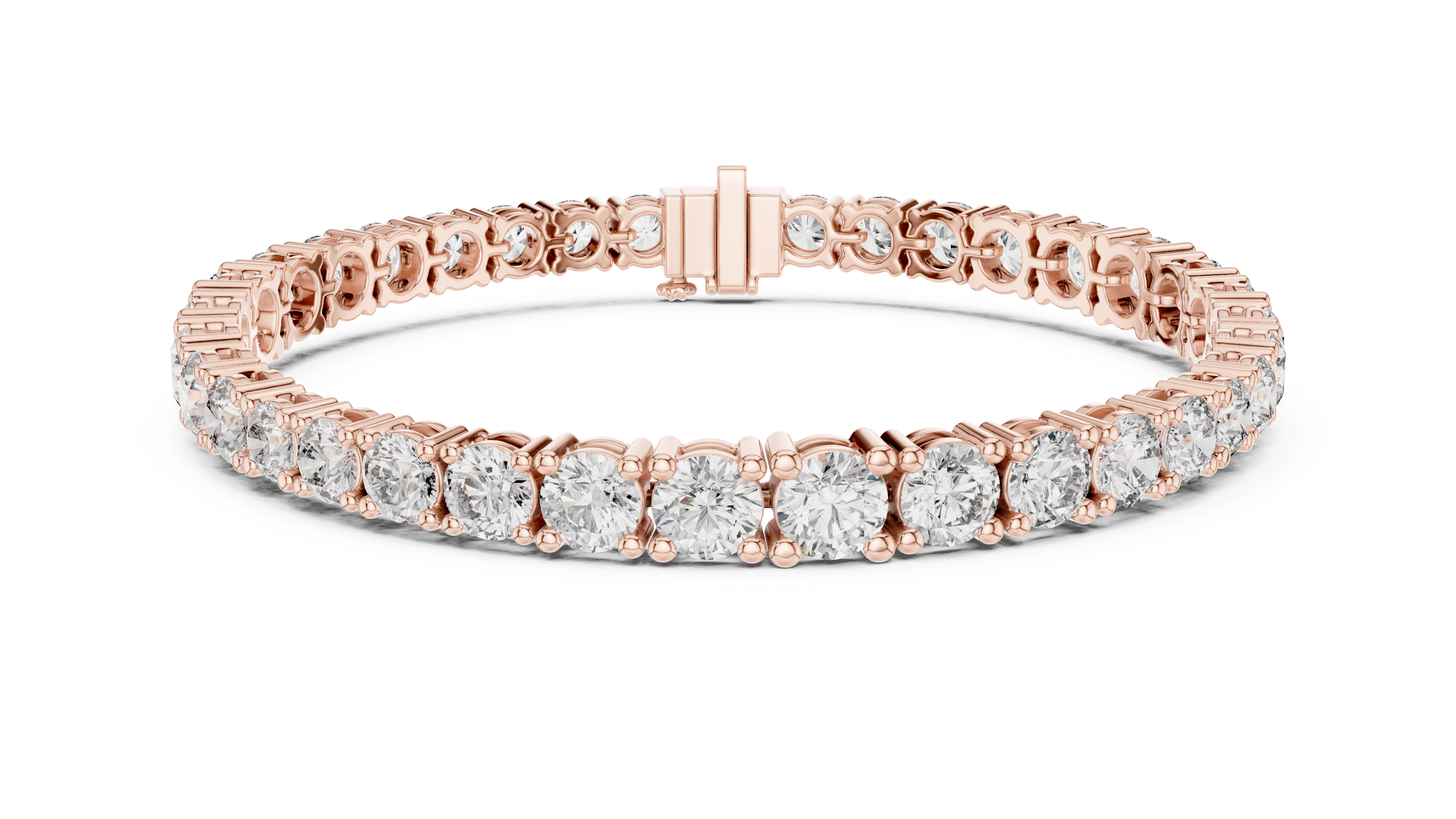 Graduated lab grown diamond tennis bracelet with varying size round diamonds in yellow white and rose gold