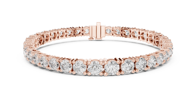 Graduated lab grown diamond tennis bracelet with varying size round diamonds in yellow white and rose gold
