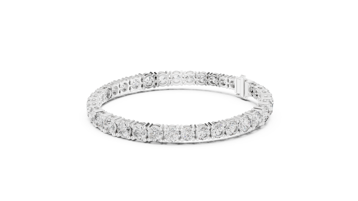 Graduated lab grown diamond tennis bracelet with varying size round diamonds in yellow white and rose gold