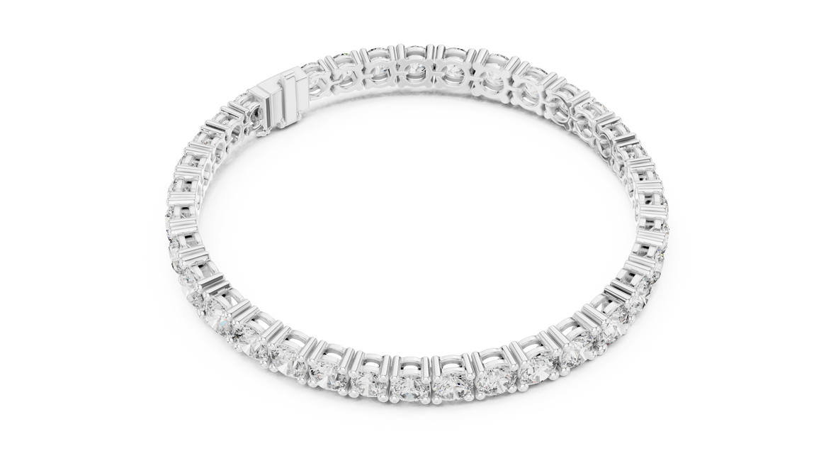 Graduated lab grown diamond tennis bracelet with varying size round diamonds in yellow white and rose gold