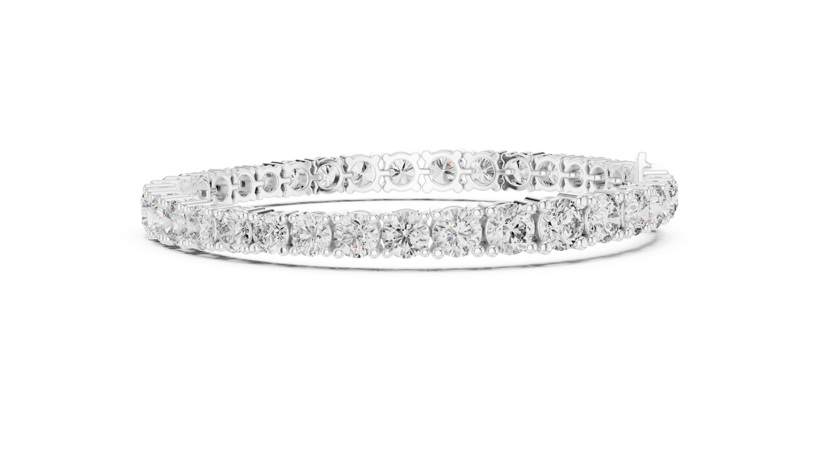 Graduated lab grown diamond tennis bracelet with varying size round diamonds in yellow white and rose gold