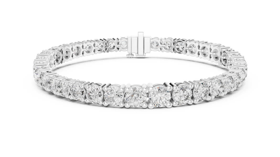 Graduated lab grown diamond tennis bracelet with varying size round diamonds in yellow white and rose gold
