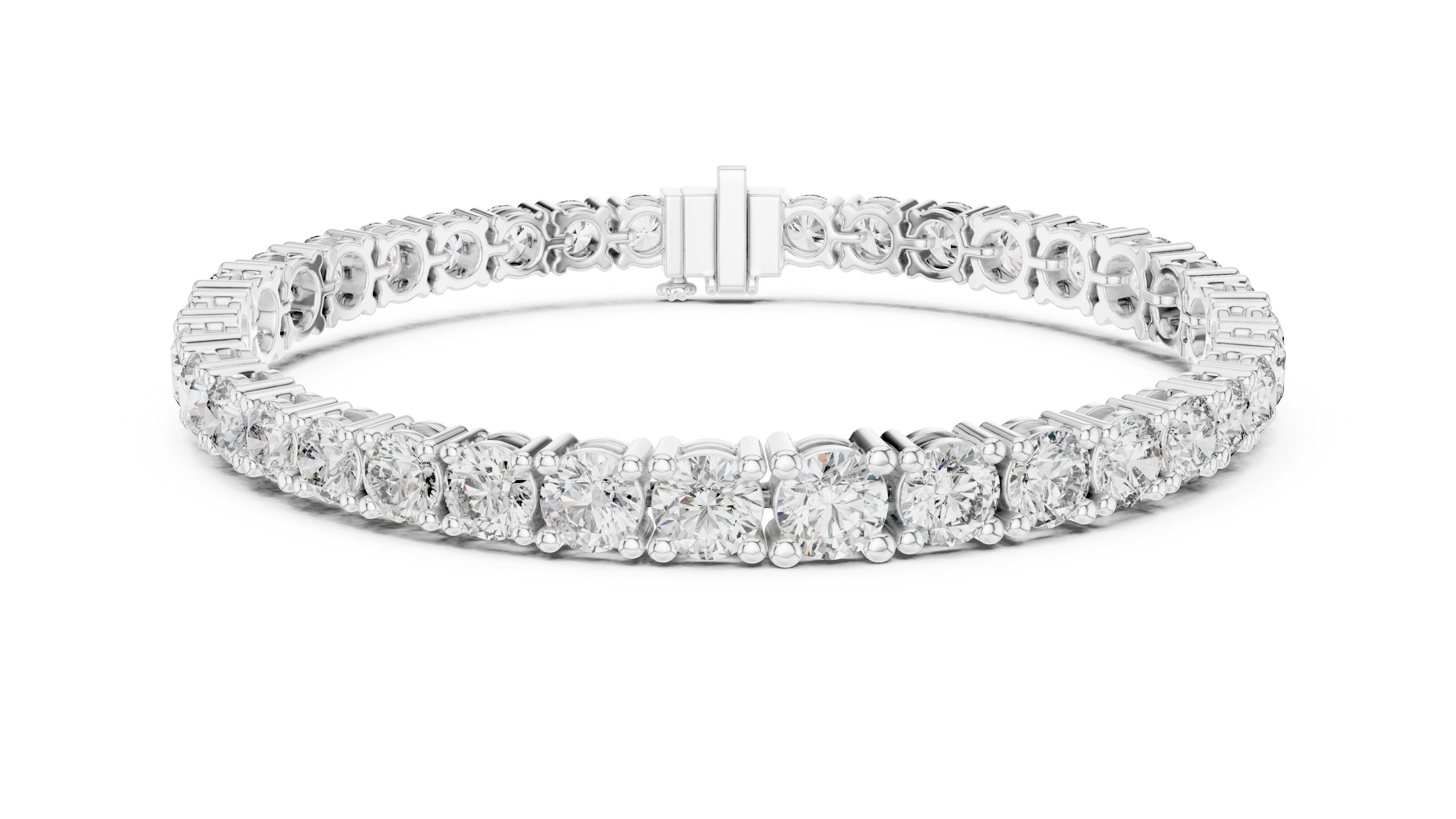 Graduated lab grown diamond tennis bracelet with varying size round diamonds in yellow white and rose gold
