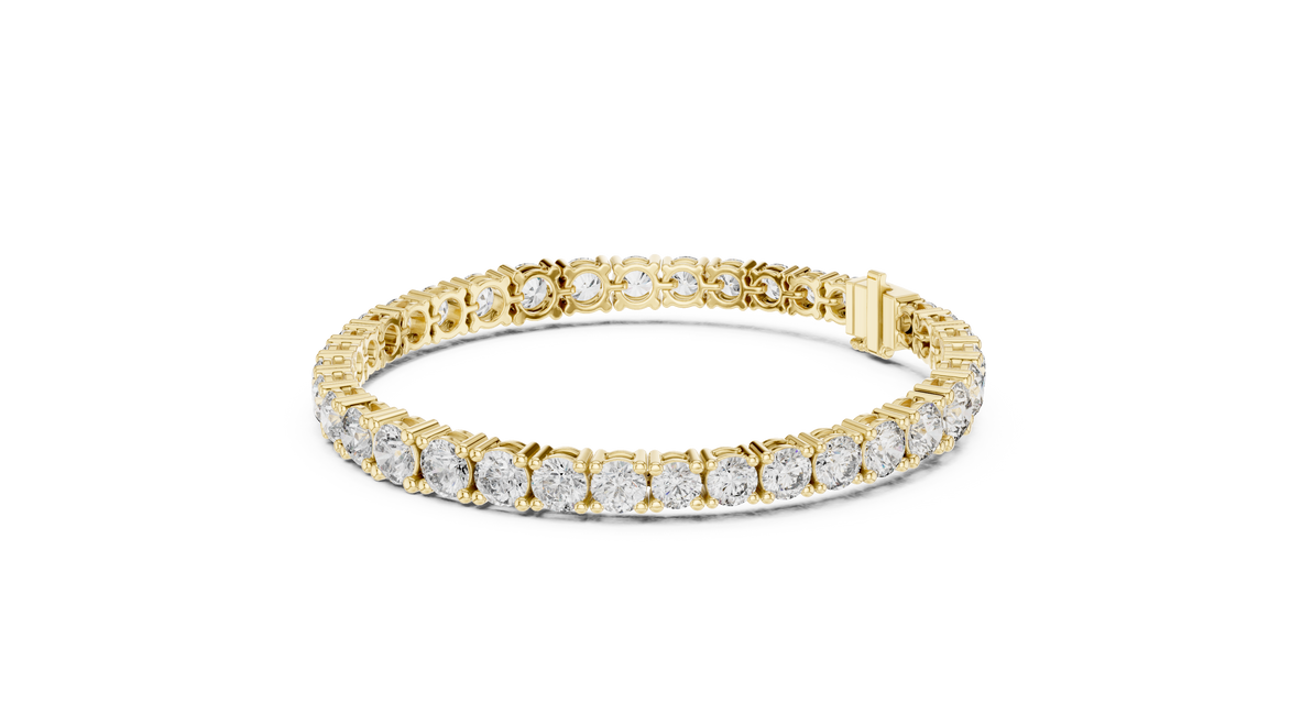 Graduated lab grown diamond tennis bracelet with varying size round diamonds in yellow white and rose gold