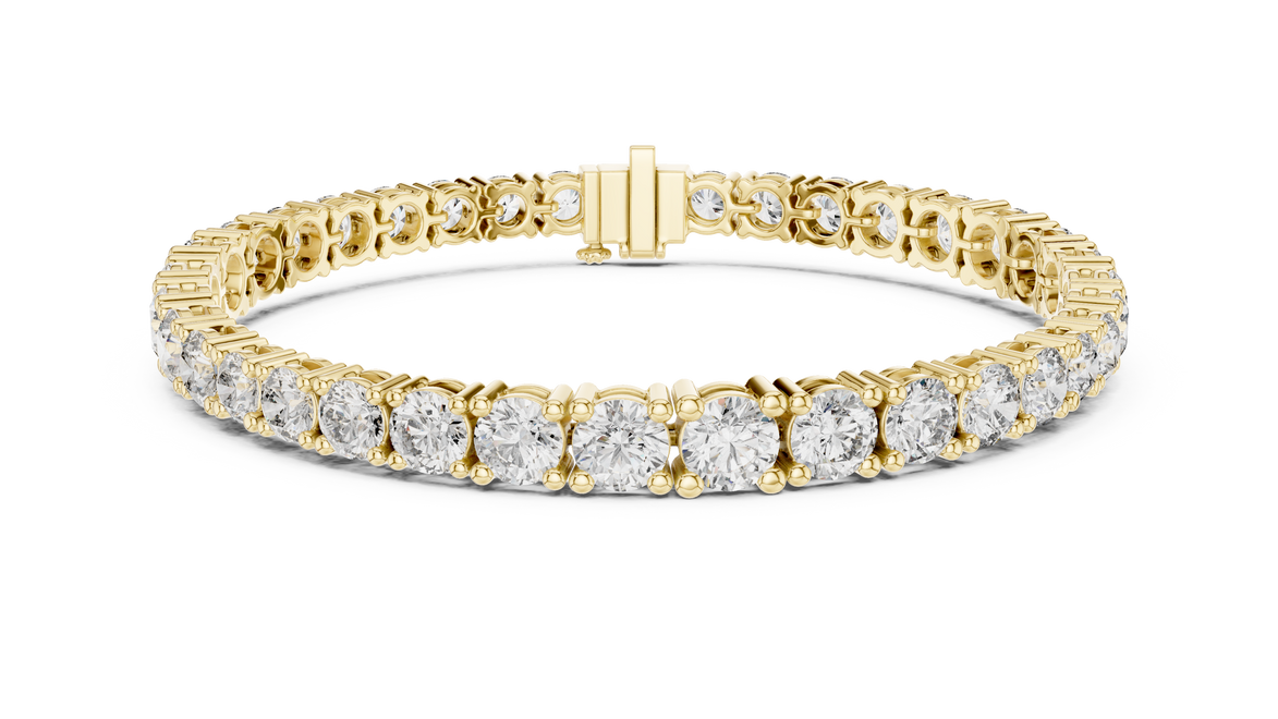 Graduated lab grown diamond tennis bracelet with varying size round diamonds in yellow white and rose gold