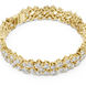 Multi shape lab grown diamond tennis bracelet with clustered round diamond design in yellow white and rose gold