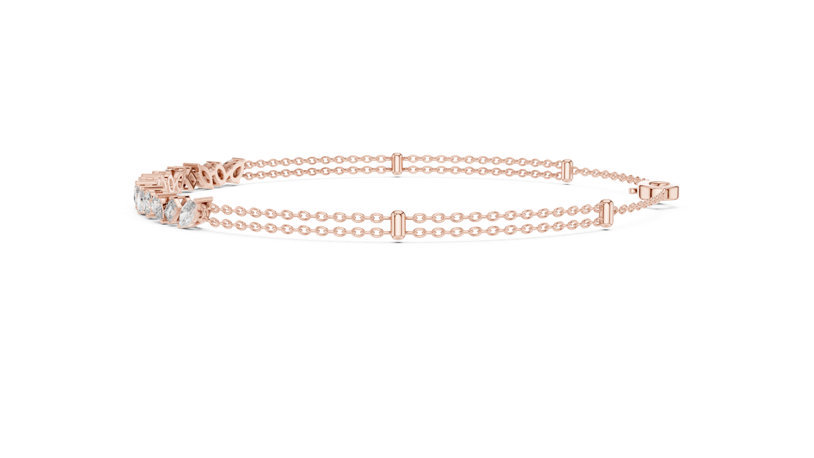 Contemporary multi shape lab grown diamond chain bracelet with pear oval marquise and emerald cut diamonds in yellow white and rose gold