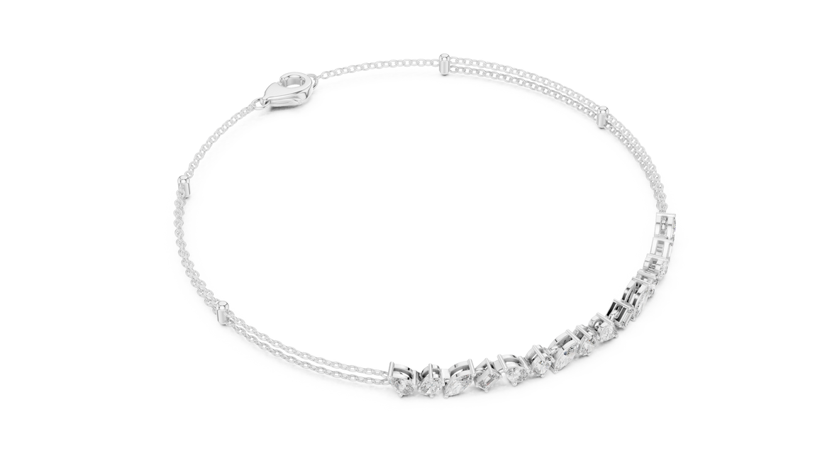 Contemporary multi shape lab grown diamond chain bracelet with pear oval marquise and emerald cut diamonds in yellow white and rose gold