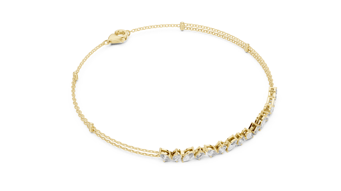 Contemporary multi shape lab grown diamond chain bracelet with pear oval marquise and emerald cut diamonds in yellow white and rose gold