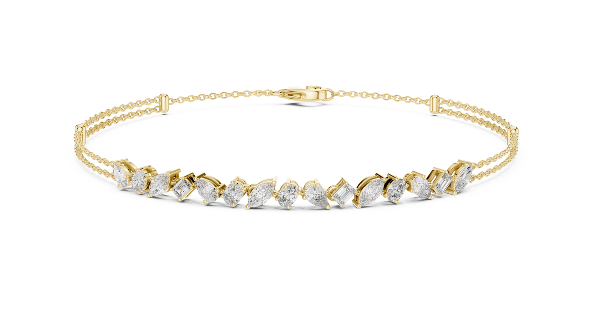Contemporary multi shape lab grown diamond chain bracelet with pear oval marquise and emerald cut diamonds in yellow white and rose gold