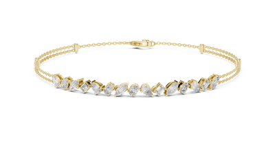 Contemporary multi shape lab grown diamond chain bracelet with pear oval marquise and emerald cut diamonds in yellow white and rose gold