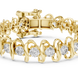 Bold link style lab grown diamond bracelet with large round cut diamonds in yellow white and rose gold