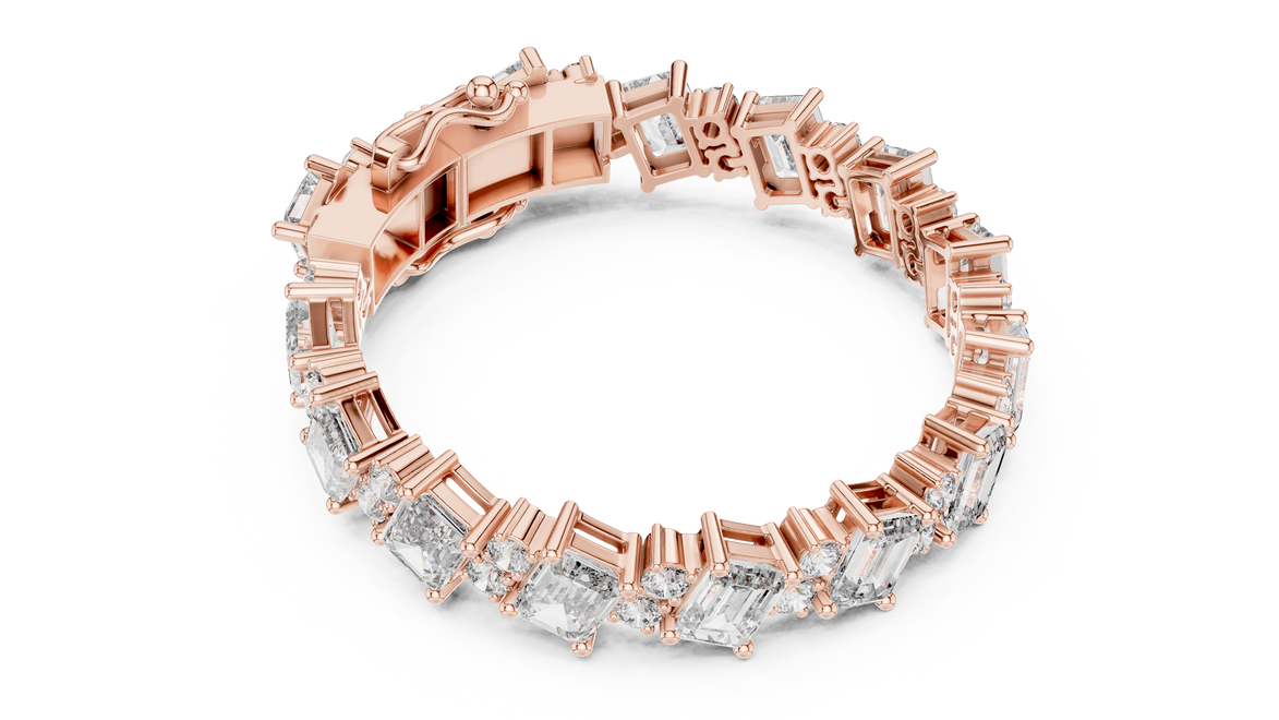 Luxury emerald cut diamond tennis bracelet in gold with round accent diamonds by Signora Jewels