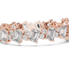 Luxury emerald cut diamond tennis bracelet in gold with round accent diamonds by Signora Jewels