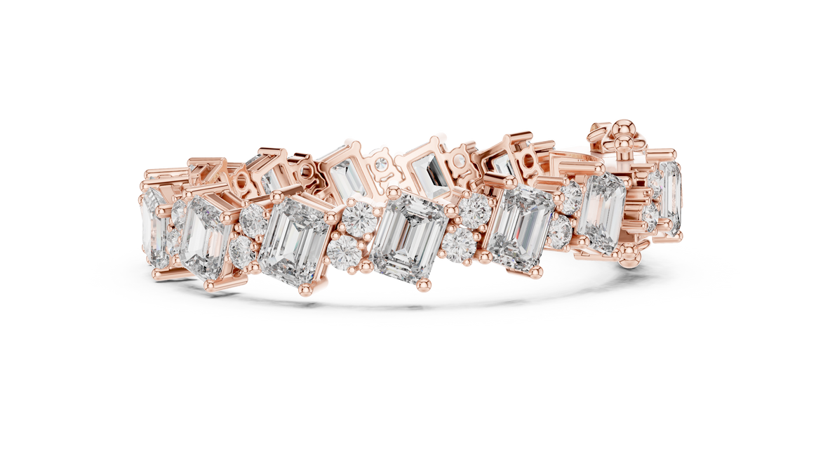 Luxury emerald cut diamond tennis bracelet in gold with round accent diamonds by Signora Jewels