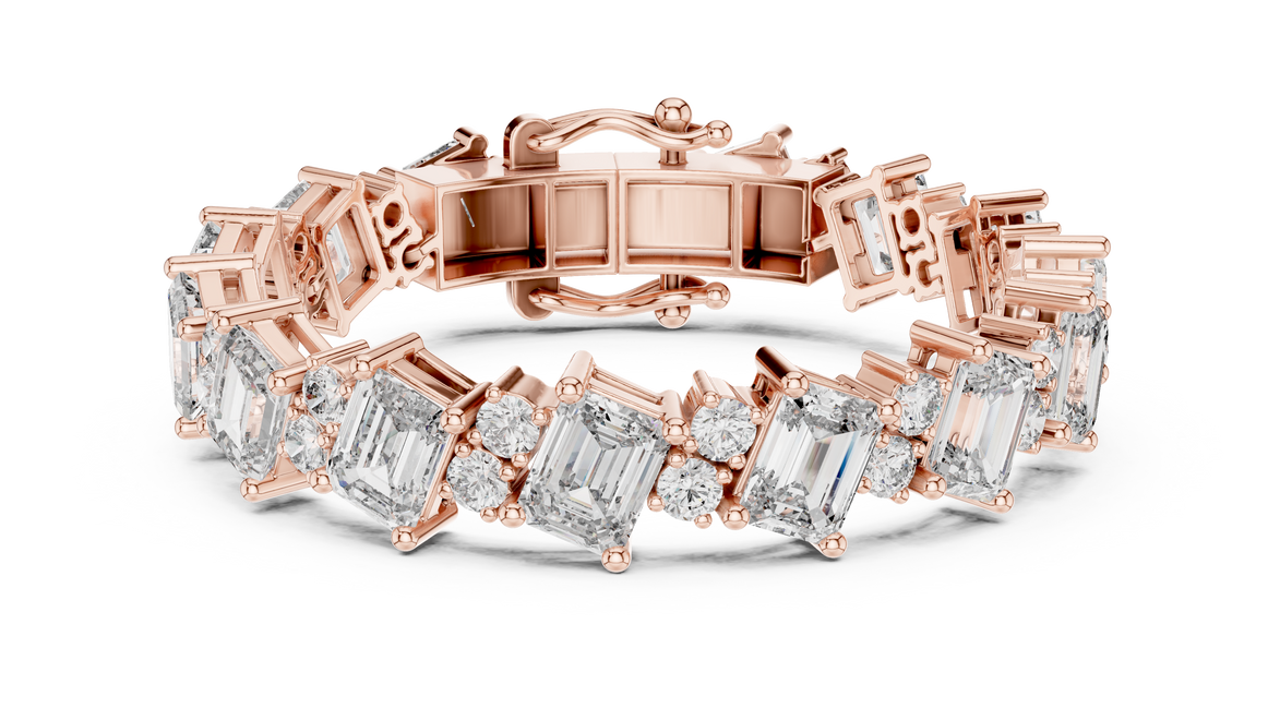 Luxury emerald cut diamond tennis bracelet in gold with round accent diamonds by Signora Jewels