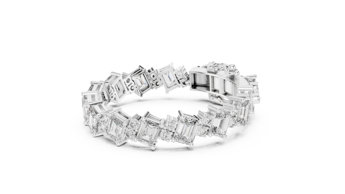 Luxury emerald cut diamond tennis bracelet in gold with round accent diamonds by Signora Jewels