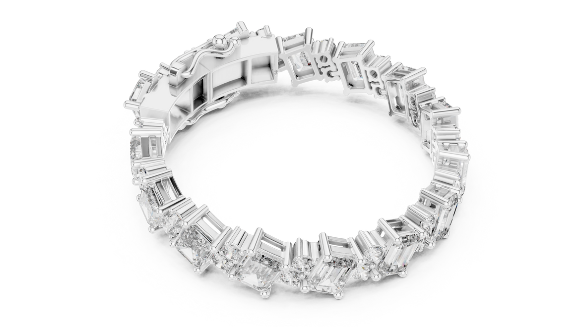 Luxury emerald cut diamond tennis bracelet in gold with round accent diamonds by Signora Jewels