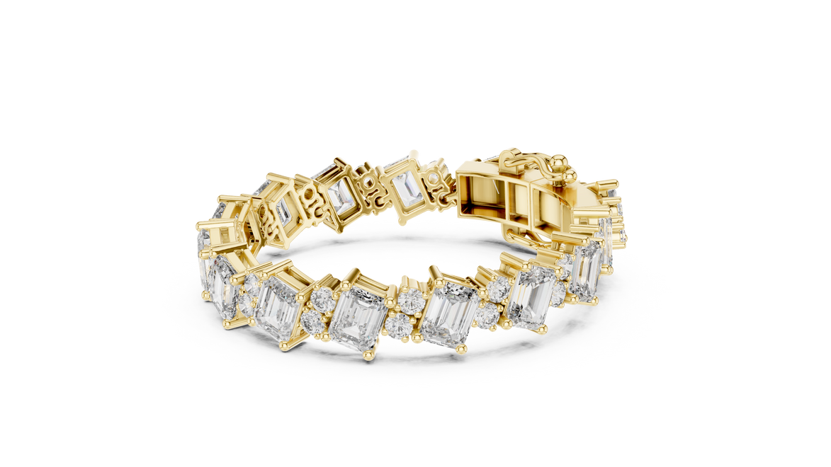 Luxury emerald cut diamond tennis bracelet in gold with round accent diamonds by Signora Jewels