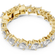 Luxury emerald cut diamond tennis bracelet in gold with round accent diamonds by Signora Jewels