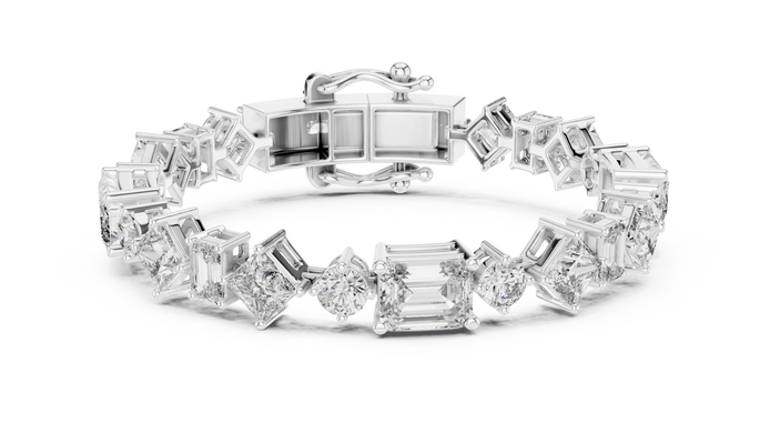 Luxury mixed shape diamond tennis bracelet in gold with emerald, princess, and round lab grown diamonds by Signora Jewels