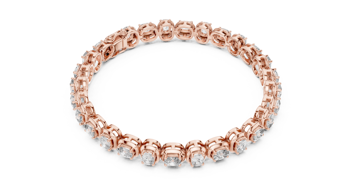 Rose gold bracelet with diamonds on a white background