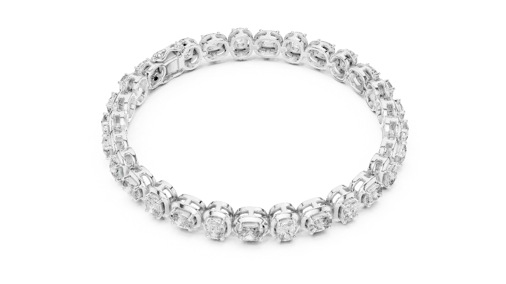 Silver ring with clear gemstones on a white background