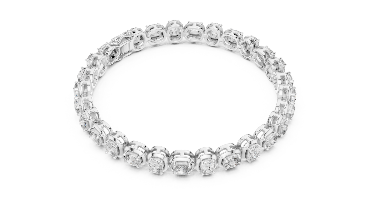 Silver ring with clear gemstones on a white background