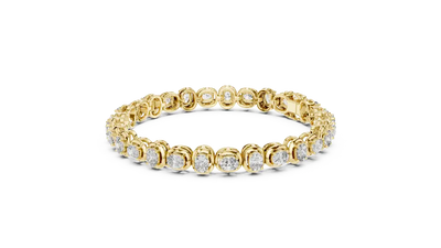 Gold bracelet with diamonds on a white background