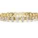 Gold bracelet with diamond accents on a white background