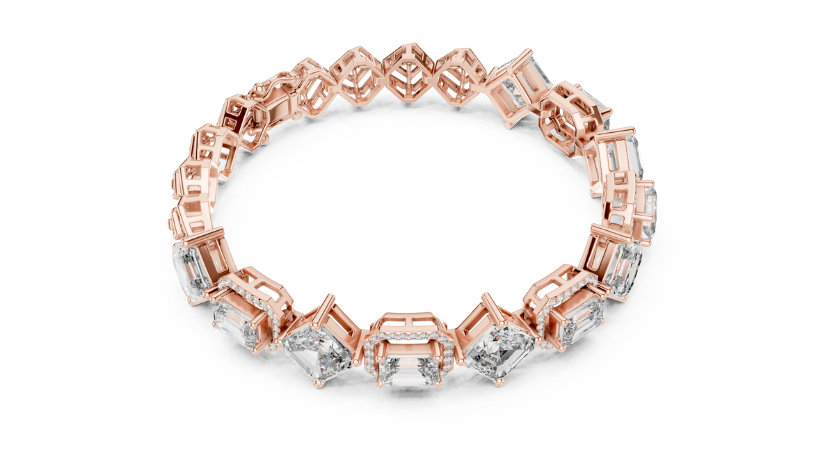 Gold and diamond bracelet on a white background