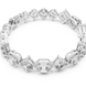 Gold and diamond bracelet on a white background