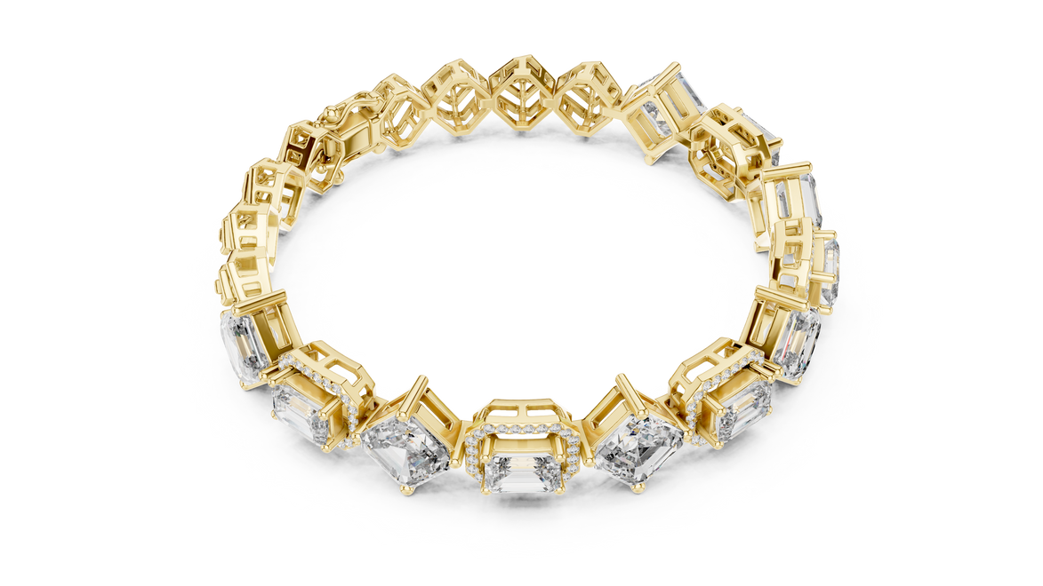 Gold and diamond bracelet on a white background