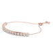 Gold bracelet with clear stones on a white background