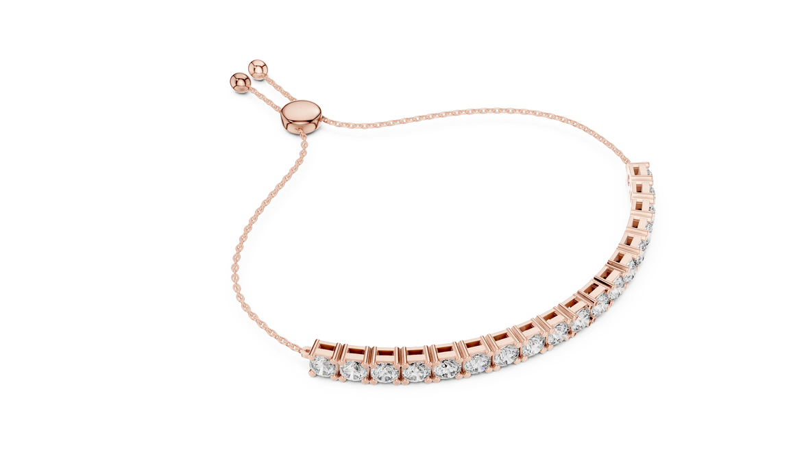Silver bracelet with clear stones on a white background