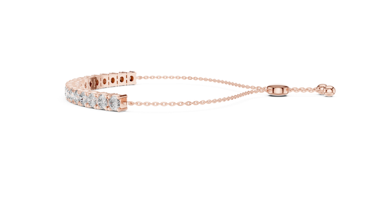 Rose gold bracelet with diamond accents on a white background