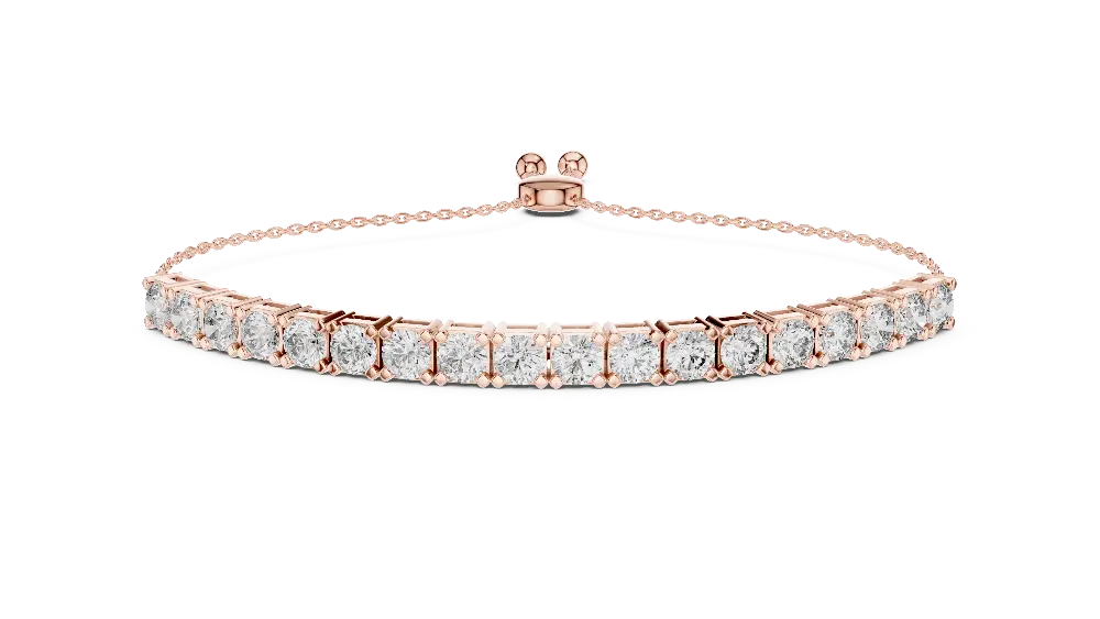 Rose gold bracelet with clear gemstones on a white background