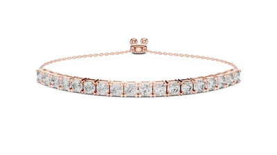 Rose gold bracelet with clear gemstones on a white background