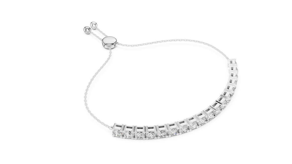 Silver bracelet with clear stones on a white background