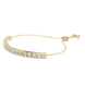 Gold bracelet with clear stones on a white background